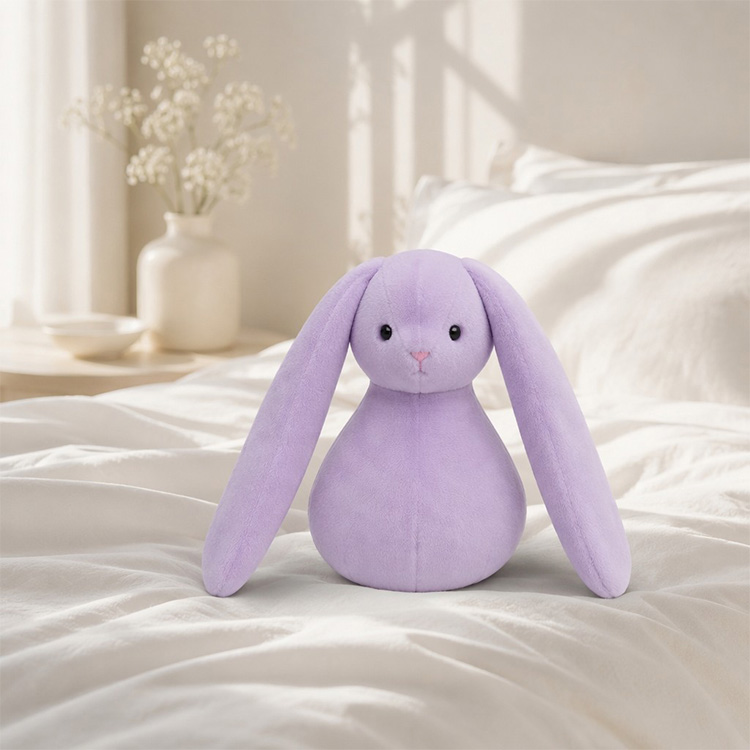 Peluche de conejito con orejas caídas moradas